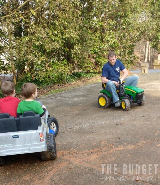 The kids and daddy on powerwheels